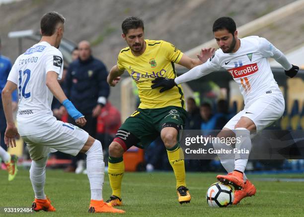 Estoril Praia midfielder Eduardo Teixeira from Brazil with FC Pacos de Ferreira defender Filipe Ferreira from Portugal in action during the Primeira...