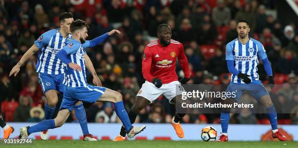 Romelu Lukaku of Manchester United in action with Davy Propper, Lewis Dunk and Beram Kayal of Brighton & Hove Albion during the Emirates FA Cup...