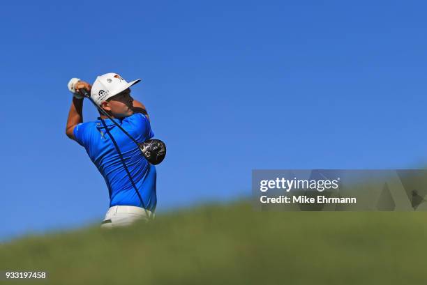 Rickie Fowler plays his shot from the 16th tee during the third round at the Arnold Palmer Invitational Presented By MasterCard at Bay Hill Club and...