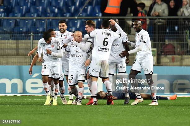 FLorent Balmont and players of Dijon celebrate the second goal during the Ligue 1 match between Montpellier Herault SC and Dijon FCO at Stade de la...