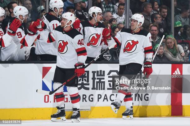 Michael Grabner and Ben Lovejoy of the New Jersey Devils celebrate after scoring a goal against the Los Angeles Kings at STAPLES Center on March 17,...