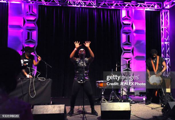 Lee Bass, Gata Misteriosa, and Assane of Gato Preto perform onstage at International Day Stage during SXSW on March 17, 2018 in Austin, Texas.