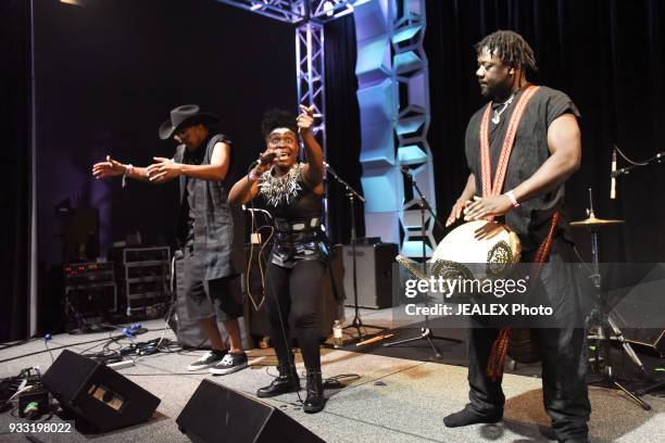 Lee Bass, Gata Misteriosa, and Assane of Gato Preto perform onstage at International Day Stage during SXSW on March 17, 2018 in Austin, Texas.