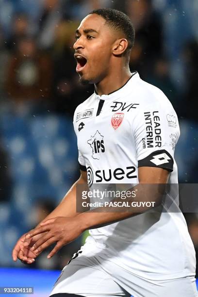Dijon's French forward Wesley Said celebrates after scoring a goal during the French L1 football match between MHSC Montpellier and Dijon, on March...