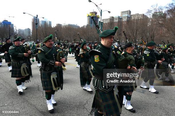 Marching band participates in the annual St. Patrick's Day parade on March 17, 2018 in Chicago, United States.