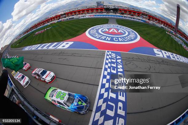 Christopher Bell, driver of the GameStop/Turtle Beach Toyota, leads the field to the green flag to start the NASCAR Xfinity Series Roseanne 300 at...