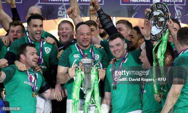 Ireland captain, Rory Best holds the Six Nations troophy, as they celebrate their Grand Slam victory during the NatWest Six Nations match between...