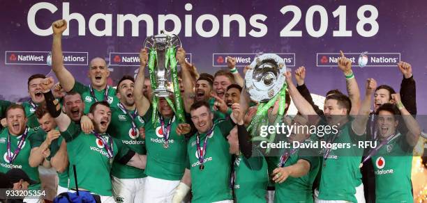 Ireland captain, Rory Best holds the Six Nations troophy, as they celebrate their Grand Slam victory during the NatWest Six Nations match between...