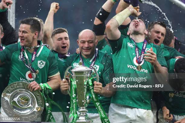 Ireland captain, Rory Best holds the Six Nations troophy, as they celebrate their Grand Slam victory during the NatWest Six Nations match between...