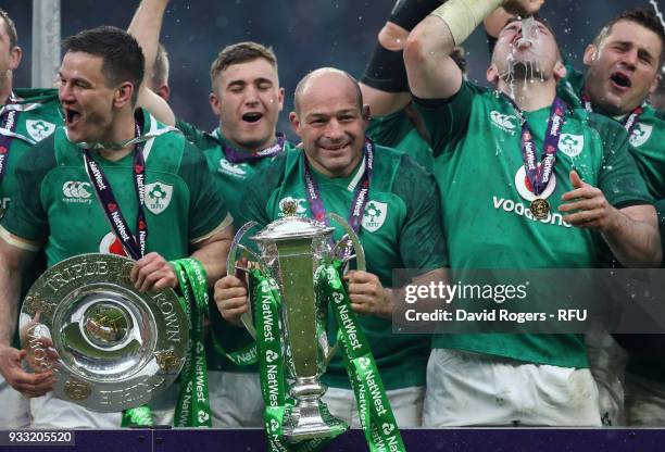 Ireland captain, Rory Best holds the Six Nations troophy, as they celebrate their Grand Slam victory during the NatWest Six Nations match between...