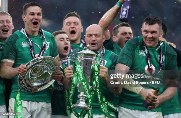 Ireland captain, Rory Best holds the Six Nations troophy, as they celebrate their Grand Slam victory during the NatWest Six Nations match between...