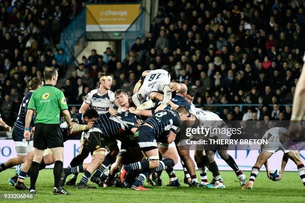 Players vie in a scrum during the French Top 14 rugby union match between Agen and Bordeaux Begles on March 17 2018 at the Armandie Stadium in Agen,...