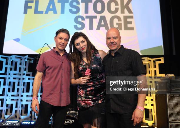 Maury LaFoy, Terra Lightfoot, and Joel Haynes pose at Saturday International Artist Showcase at Flatstock during SXSW at Austin Convention Center on...