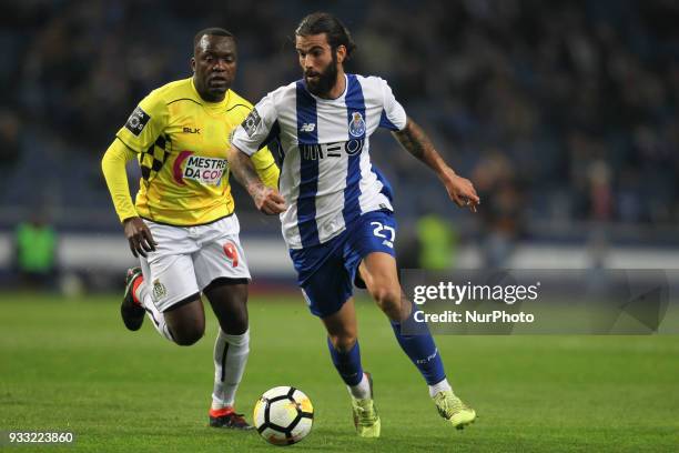 Porto's Portuguese midfielder Sergio Oliveira with Boavista's forward Ide Colubali during the Premier League 2017/18 match between FC Porto v...