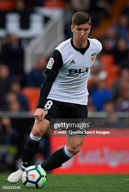 Luciano Vietto of Valencia in action during the La Liga match between Valencia and Deportivo Alaves at Mestalla stadium on March 17, 2018 in...