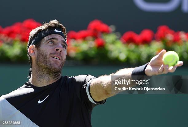 Juan Martin Del Potro of Argentina serves against Milos Raonic of Canada during the semifinal match on Day 13 of the BNP Paribas Open on March 17,...