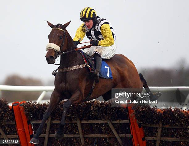Jason Maguire and Whiteoak clear the last flight to land TheStarlight Children's Foundation Mares' Hurdle Race run at Kempton Park Racecourse on...