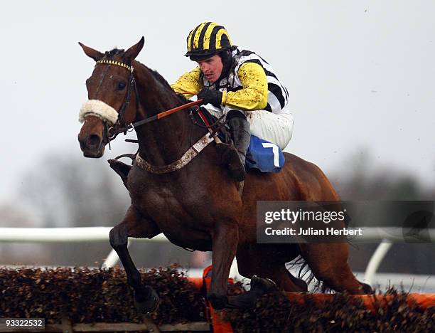 Jason Maguire and Whiteoak clear the last flight to land TheStarlight Children's Foundation Mares' Hurdle Race run at Kempton Park Racecourse on...