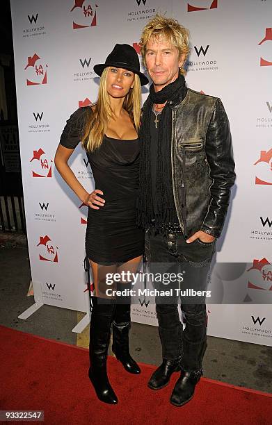 Rock musician Duff McKagan and guest arrive at the "LAYN Rocks" benefit concert for the Los Angeles Youth Network, held at the Avalon nightclub on...