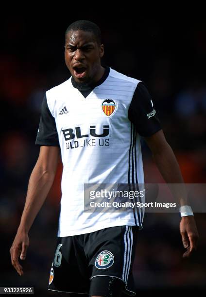 Geoffrey Kondogbia of Valencia reacts during the La Liga match between Valencia and Deportivo Alaves at Mestalla stadium on March 17, 2018 in...