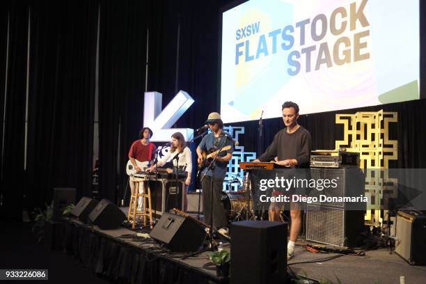 Adam MacPherson, Rosie Long Decter, Chris Steward, and Tom Gould of Bodywash perform onstage at Saturday International Artist Showcase at Flatstock...