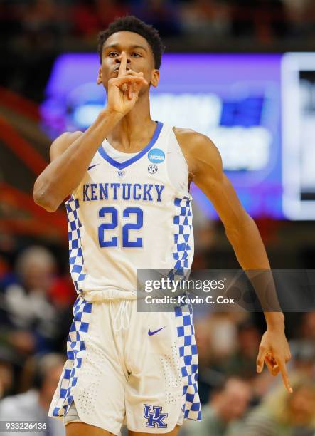 Shai Gilgeous-Alexander of the Kentucky Wildcats gestures during the first half against the Buffalo Bulls in the second round of the 2018 NCAA Men's...