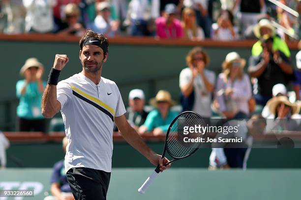 Roger Federer celebrates match point against Borna Coric of Croatia during their semifinal match at BNP Paribas Open - Day 13 on March 17, 2018 in...