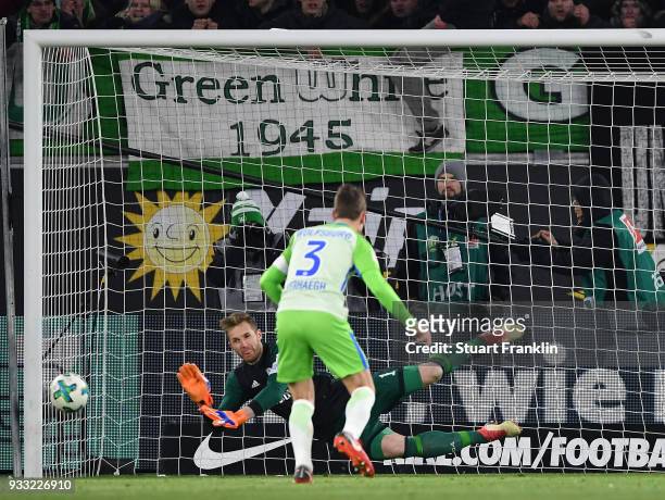 Ralf Fhrmann of Schalke saves the penalty shot by Paul Verhaegh of Wolfsburg during the Bundesliga match between VfL Wolfsburg and FC Schalke 04 at...