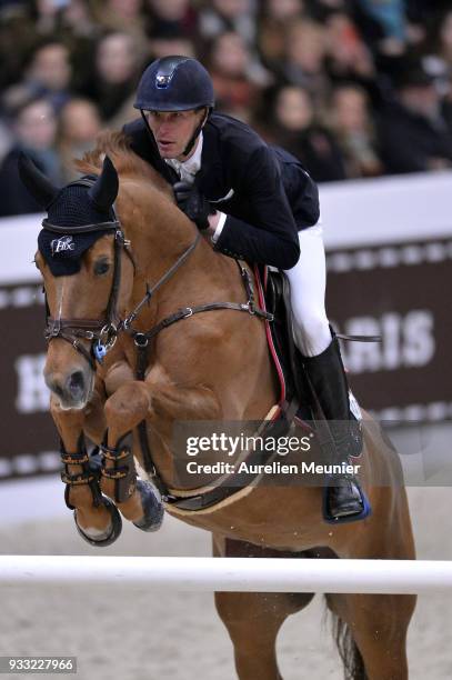 Kevin Staut of France on Ayade De Septon Et Hdc competes during the Saut Hermes at Le Grand Palais on March 17, 2018 in Paris, France.