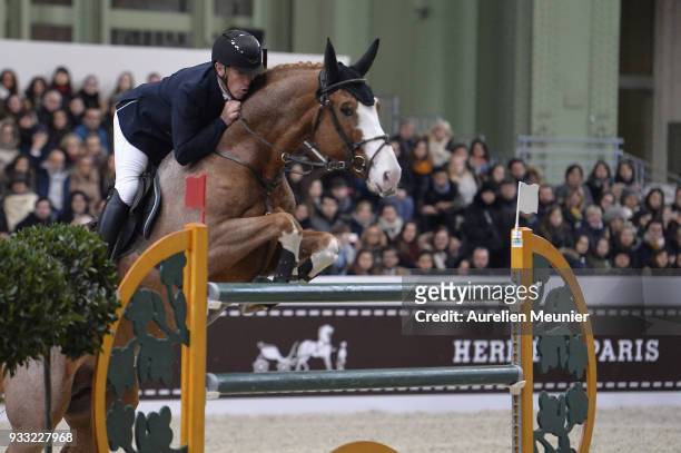 Kevin Staut of France on Ayade De Septon Et Hdc competes during the Saut Hermes at Le Grand Palais on March 17, 2018 in Paris, France.