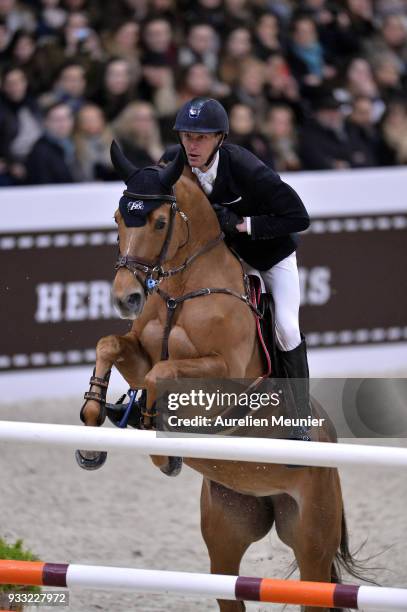 Kevin Staut of France on Ayade De Septon Et Hdc competes during the Saut Hermes at Le Grand Palais on March 17, 2018 in Paris, France.