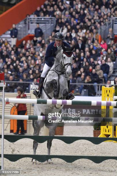 Robert Smith of Great Britain on Cimano E competes during the Saut Hermes at Le Grand Palais on March 17, 2018 in Paris, France.