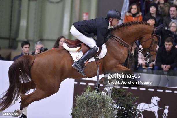 Jerome Guery of Belgium on Jupiter VG competes during the Saut Hermes at Le Grand Palais on March 17, 2018 in Paris, France.