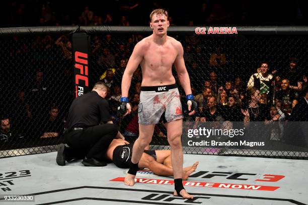 Alexander Volkov of Russia reacts after defeating Fabricio Werdum of Brazil in their heavyweight bout inside The O2 Arena on March 17, 2018 in...