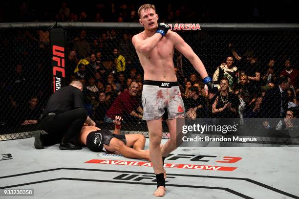 Alexander Volkov of Russia reacts after defeating Fabricio Werdum of Brazil in their heavyweight bout inside The O2 Arena on March 17, 2018 in...