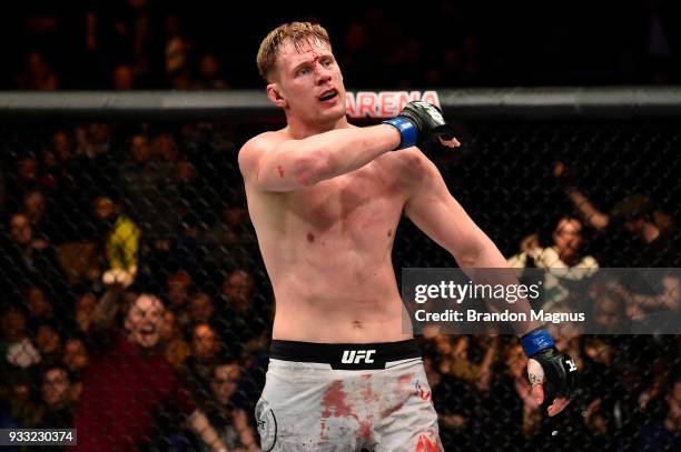 Alexander Volkov of Russia reacts after defeating Fabricio Werdum of Brazil in their heavyweight bout inside The O2 Arena on March 17, 2018 in...