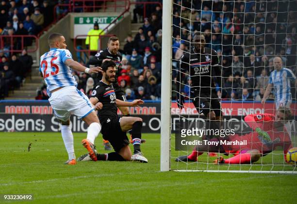 James Tomkins of Crystal Palace scoring their first goal during the Premier League match between Huddersfield Town and Crystal Palace at John Smith's...