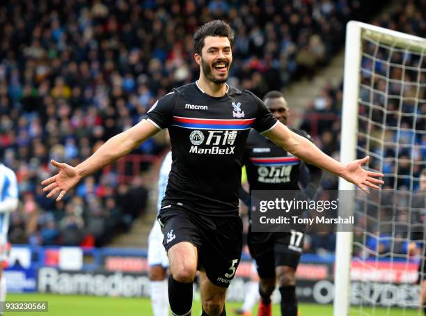 James Tomkins of Crystal Palace celebrates scoring their first goal during the Premier League match between Huddersfield Town and Crystal Palace at...