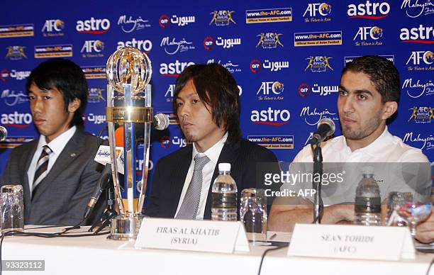 Kengo Nakamura from Japan , compatriot Yasuhito Endo and Firas Al Khatib from Syria , nominees for the AFC Player of the Year 2009 award, attend a...