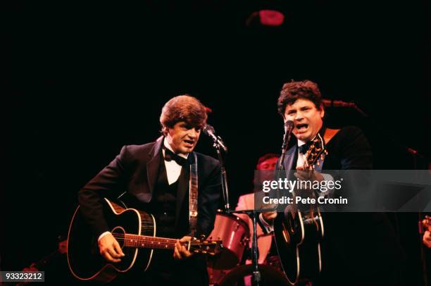 Phil and Don Everly, of American rock and roll duo the Everly Brothers, performing a reunion concert at the Royal Albert Hall, London, 22nd September...