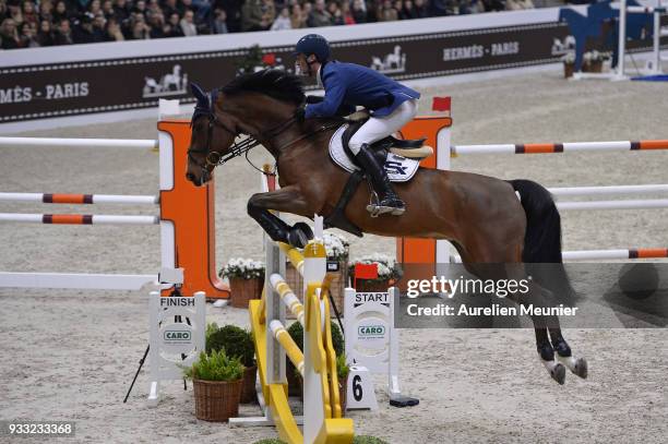 Daniel Deusser of Germany on Equita Van T Zorgvliet competes during the Saut Hermes at Le Grand Palais on March 17, 2018 in Paris, France.