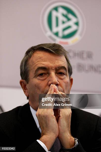 General Secretary Wolfgang Niersbach pauses during a press conference on the rising manipulation scandal in European football at the headquarters of...