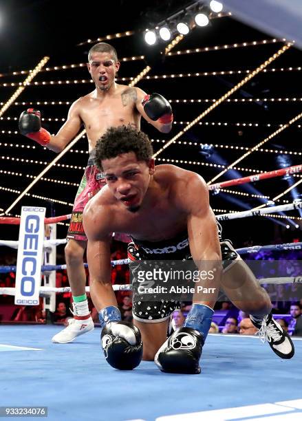 Antonio Lozada Jr. Knocks down Felix Verdejo during their lightweight fight at The Theatre at Madison Square Garden on March 17, 2018 in New York...