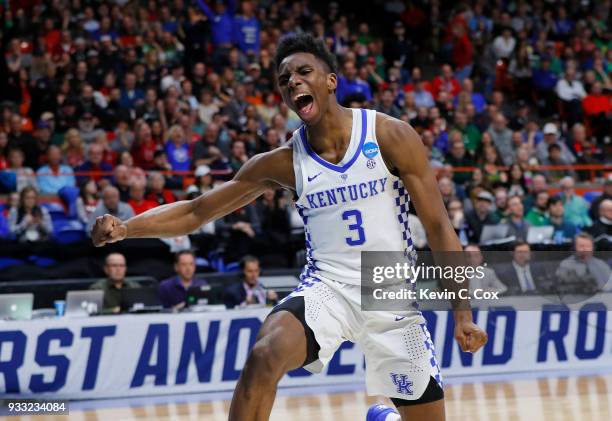 Hamidou Diallo of the Kentucky Wildcats celebrates after dunking against the Buffalo Bulls during the second half in the second round of the 2018...