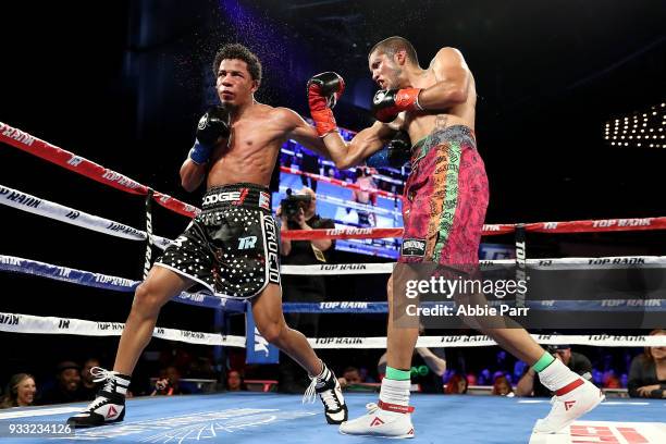 Antonio Lozada Jr. Punches Felix Verdejo during their lightweight fight fight at The Theatre at Madison Square Garden on March 17, 2018 in New York...