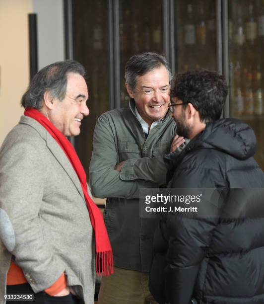 Filmmaker Oliver Stone, Sun Valley Film Festival Executive Director Teddy Grennan, and actor Jay Duplass attend the 2018 Sun Valley Film Festival -...