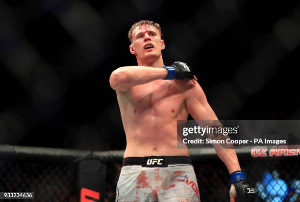 Alexander Volkov reacts to beating Fabricio Werdum and during their Heavyweight fight at The O2 Arena, London.