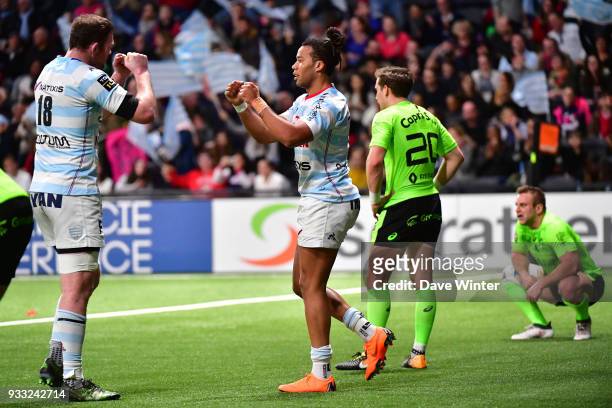 Teddy Thomas of Racing 92 celebrates his second try during the Top 14 match between Racing 92 and Stade Francais at U Arena on March 17, 2018 in...