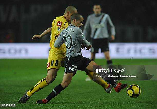 Sebastian Giovinco of Juventus FC is challenged by Gokhan Inler of Udinese Calcio during the Serie A match between Juventus and Udinese at Stadio...