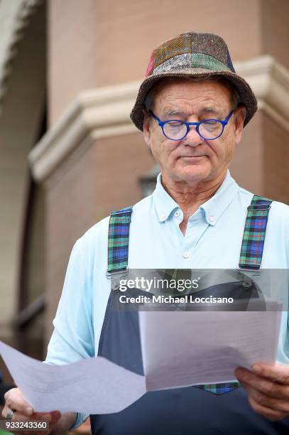 Actor Bill Murray reads a poem to a crowd before the "Isle of Dogs" premiere at The Driskill Hotel on March 17, 2018 in Austin, Texas.